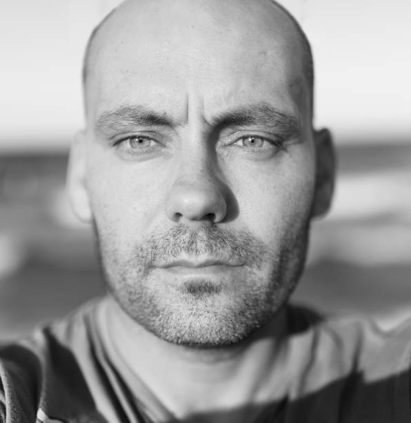 istock Green eyes man auto portrait 700268876