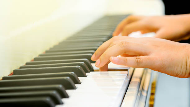 istock Finger of a pianist 700275692