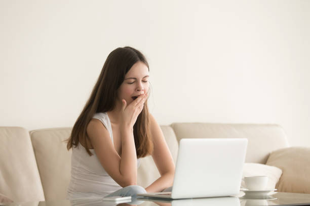istock Female student feels lack of sleep and drowsiness 700287106