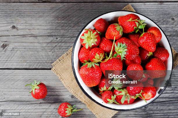 Red Berry Strawberry In Metal Mug On Rustic Wooden Background Directly Above Top View Stock Photo - Download Image Now