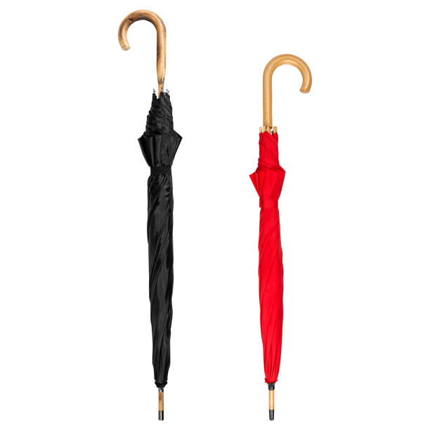 istock Black and red umbrella, isolated white background 700290818