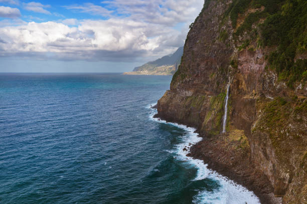 istock Waterfall Veu da Noiva (Bride's veil) - Madeira United Kingdom 700293042
