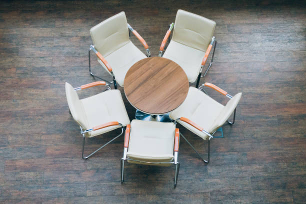istock Top view of round table and chairs 700303820