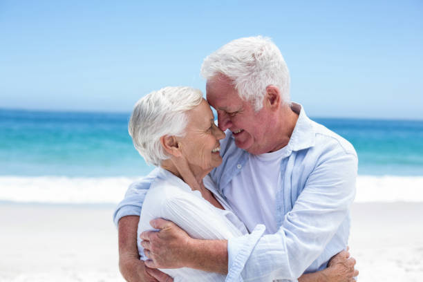 istock Senior couple embracing head to head 700341766