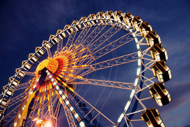 Ferris wheel by night stock photo