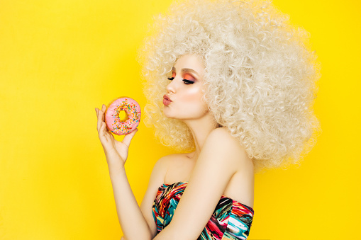 Pretty blonde with pink donuts