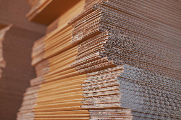 istock Big stuck of clean cardboard texture background close up 700388370