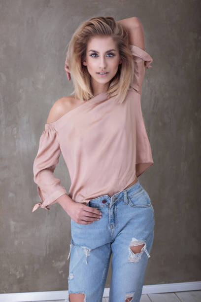 istock Fashionable blonde girl posing. 700404796