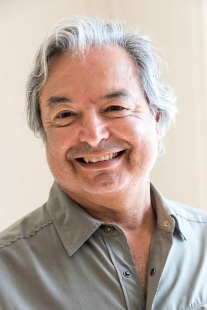 istock Mature senior man looking at the camera 700428016
