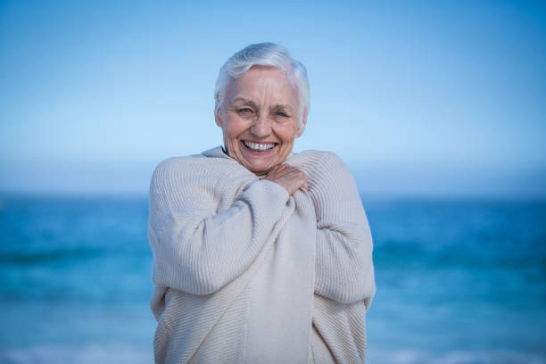istock Senior woman smiling at the camera 700432854