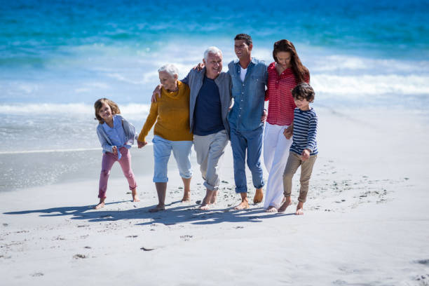 istock Happy family walking together 700435552