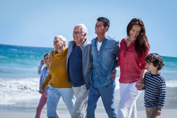 istock Happy family walking together 700435568
