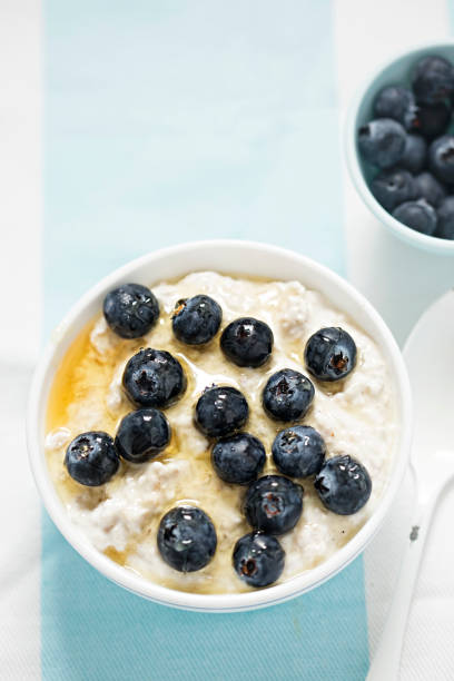 istock Porridge with yoghurt, blueberries and honey 700447984