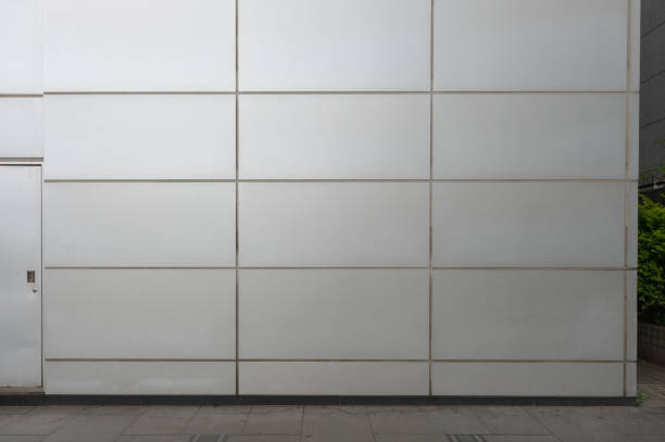 istock street wall background ,Industrial background, empty grunge urban street with warehouse brick wall 700469708