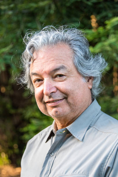 istock Mature senior man looking at the camera 700473772