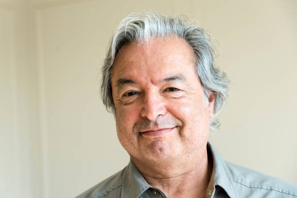 istock Mature senior man looking at the camera 700478826