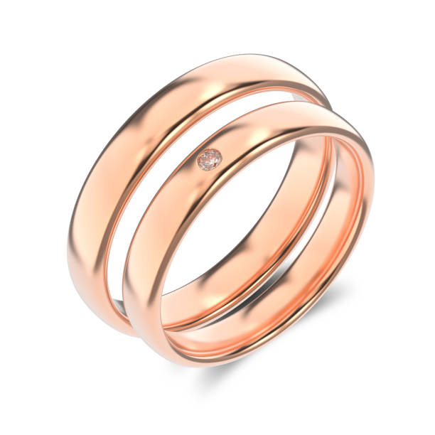 istock 3D illustration two classic rose gold rings with diamond on a white background 700479220