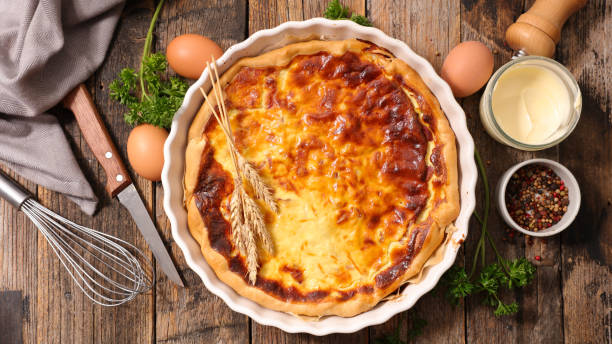 istock quiche with ingredient on wooden background 700479380
