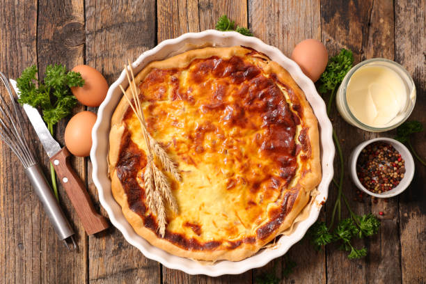 istock quiche with ingredient on wooden background 700479382