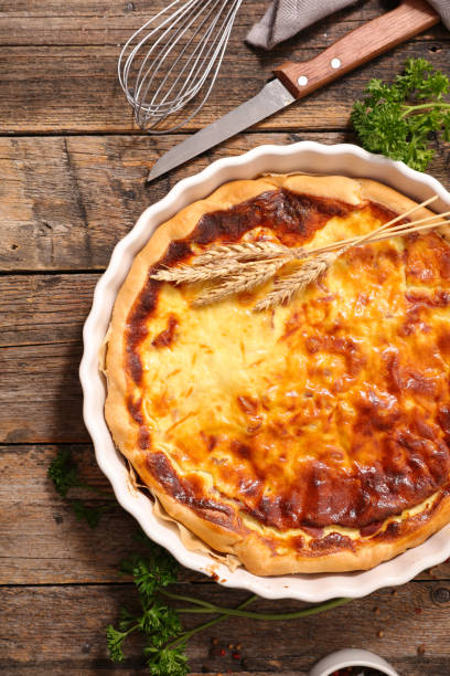 istock quiche with ingredient on wooden background 700479390