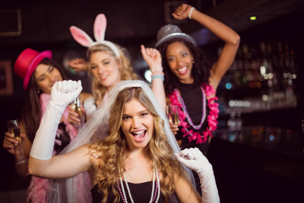 Friends celebrating bachelorette party Friends celebrating bachelorette party in a nightclub bachelorette party stock pictures, royalty-free photos & images
