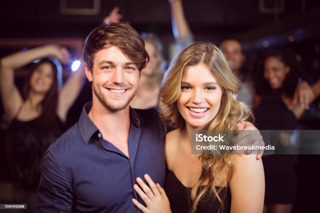 Portrait of smiling couple Portrait of smiling couple in a nightclub 20-24 Years Stock Photo