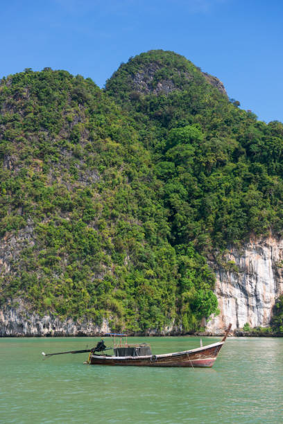 istock Beautiful Island with longtail boat in Phang Nga Bay 700497906