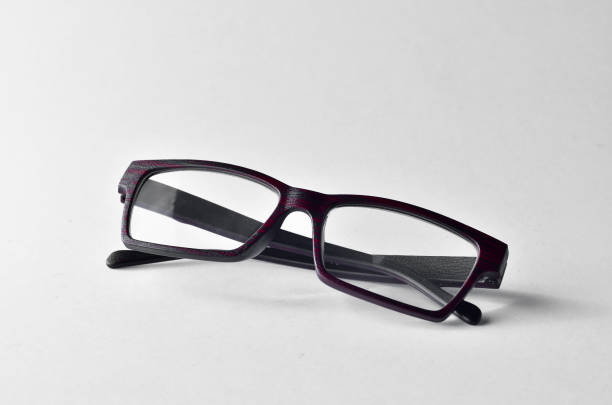 istock Unique glasses with wood texture frame over  white background 700516420