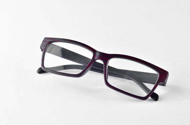 istock Unique glasses with wood texture frame over  white background 700518706