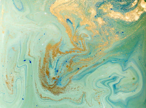 istock Marbled blue, green and golden abstract background. Liquid marble pattern. 700525416