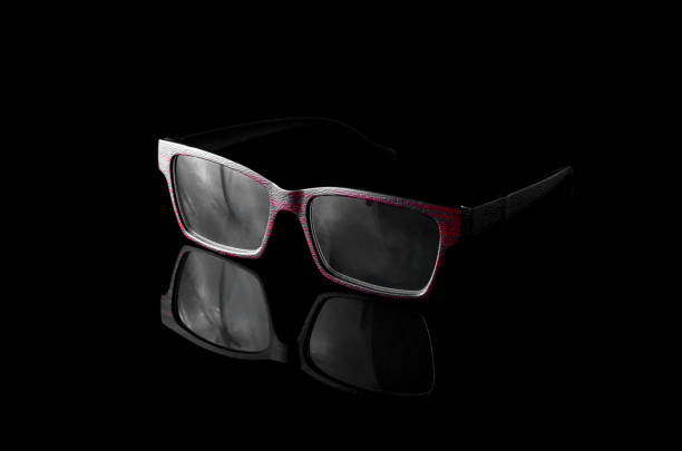 istock Unique glasses with wood texture frame over  black background 700531294