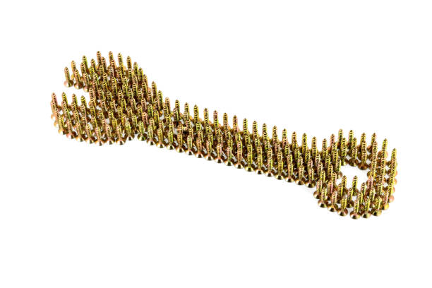 istock Double-sided wrench drawing with yellow avarage galvanized screws isolated on white background 700561298