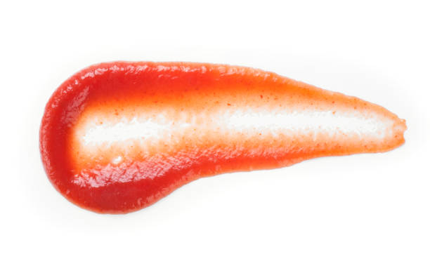 istock Drops of ketchup on a white background. 700577176