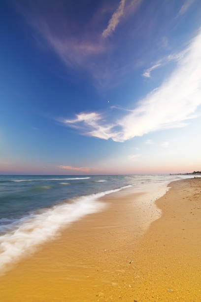 istock beach and beautiful tropical sea. 700585204