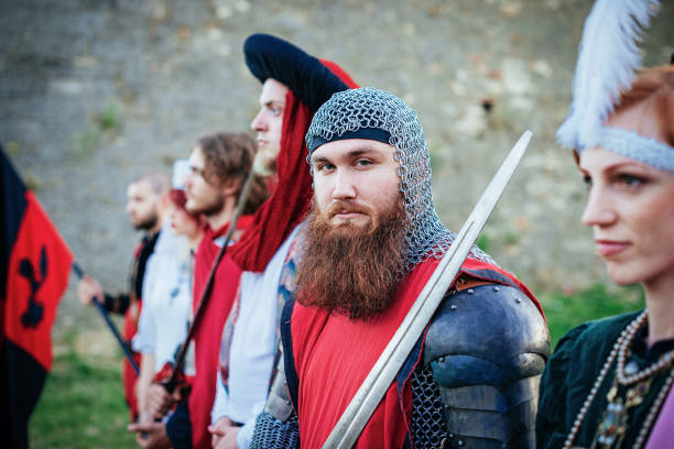 istock Young medieval duke with beard, protecting the princess 700606006