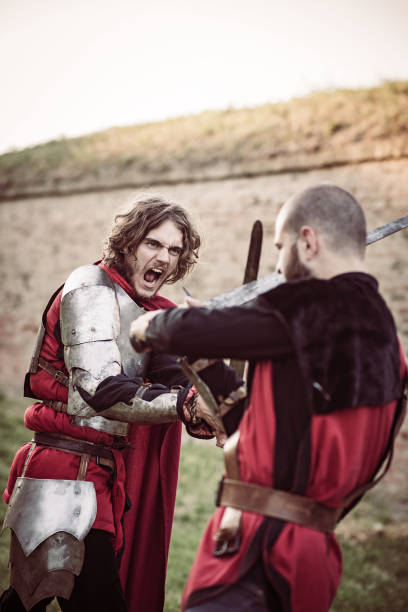 istock Two medieval Templar knights in the battle 700606022