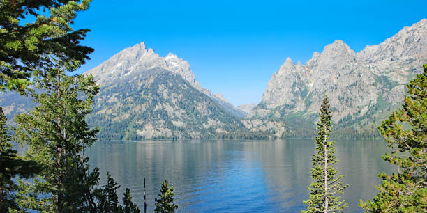 Panoramic summer landscape image of Jenny Lake in Grand Teton National Park, Wyoming, USA