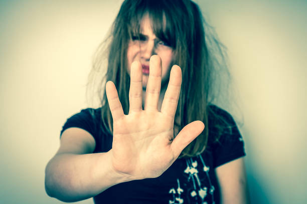 istock Woman is showing stop gesture with her hand 700633500