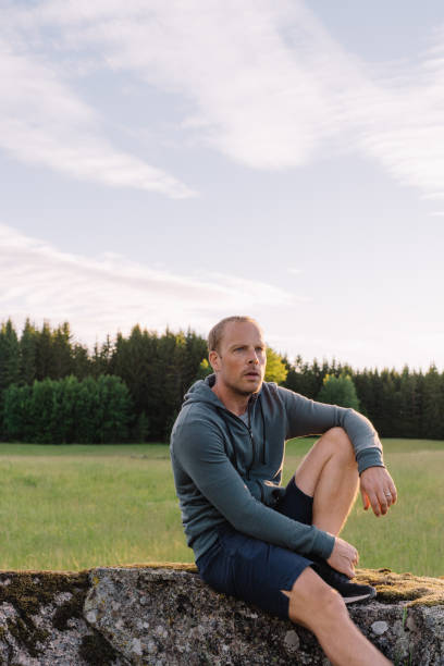 istock Man outdoors in Nature enjoying fresh air 700648946