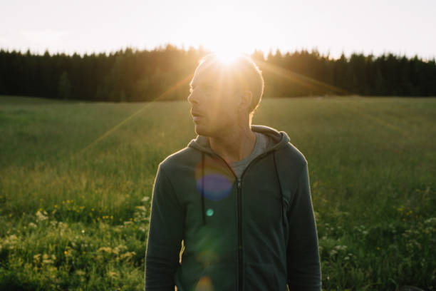 istock Man outdoors in Nature enjoying fresh air 700649216