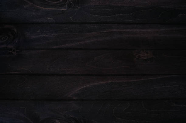 istock Noir elegance black wooden board background. Wood texture. 700654094