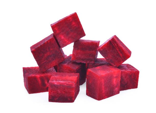 cubes of fresh beetroot isolated on white background