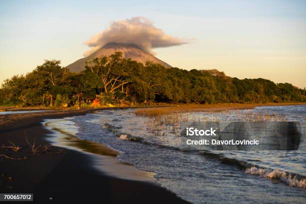 Jesus And Mary Beach On Island Ometepe In Lake Nicaragua With Volcano In Background Nicaragua Stock Photo - Download Image Now