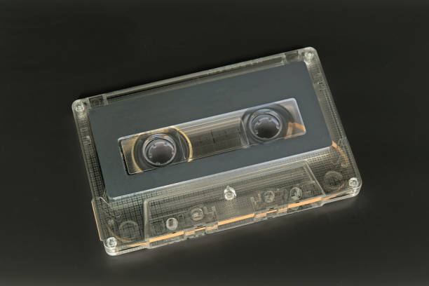 istock Closeup Cassette Tape on Dark Gray Background 700661440