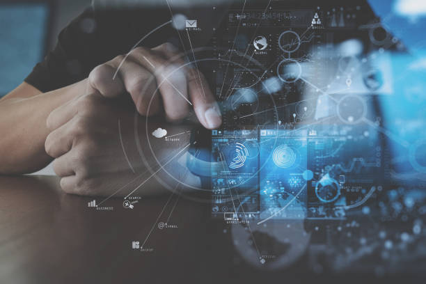 istock businessman hand working with smart watch computer in modern office with virtual icon diagram 700664792