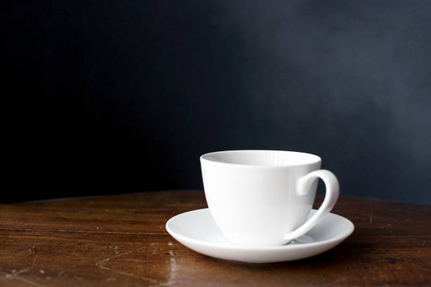 istock Closeup of coffee cup on wooden table 700669520