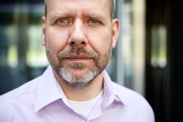 istock Headshot of mature man 700673218