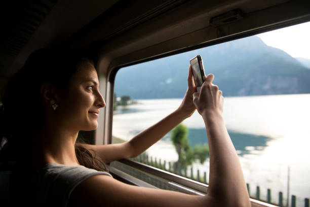 istock Smiling woman making a photo. 700677992