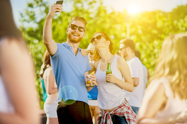 istock Couple at festiavl 700678478
