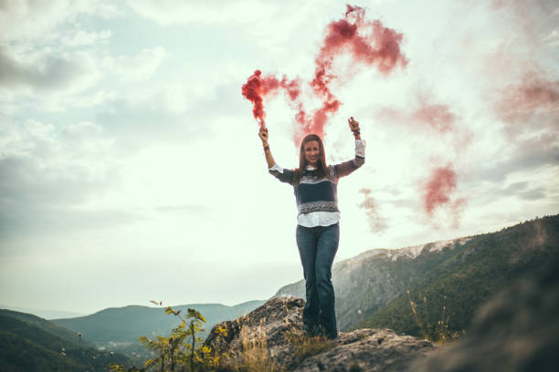istock Girl with flaming torch 700686028